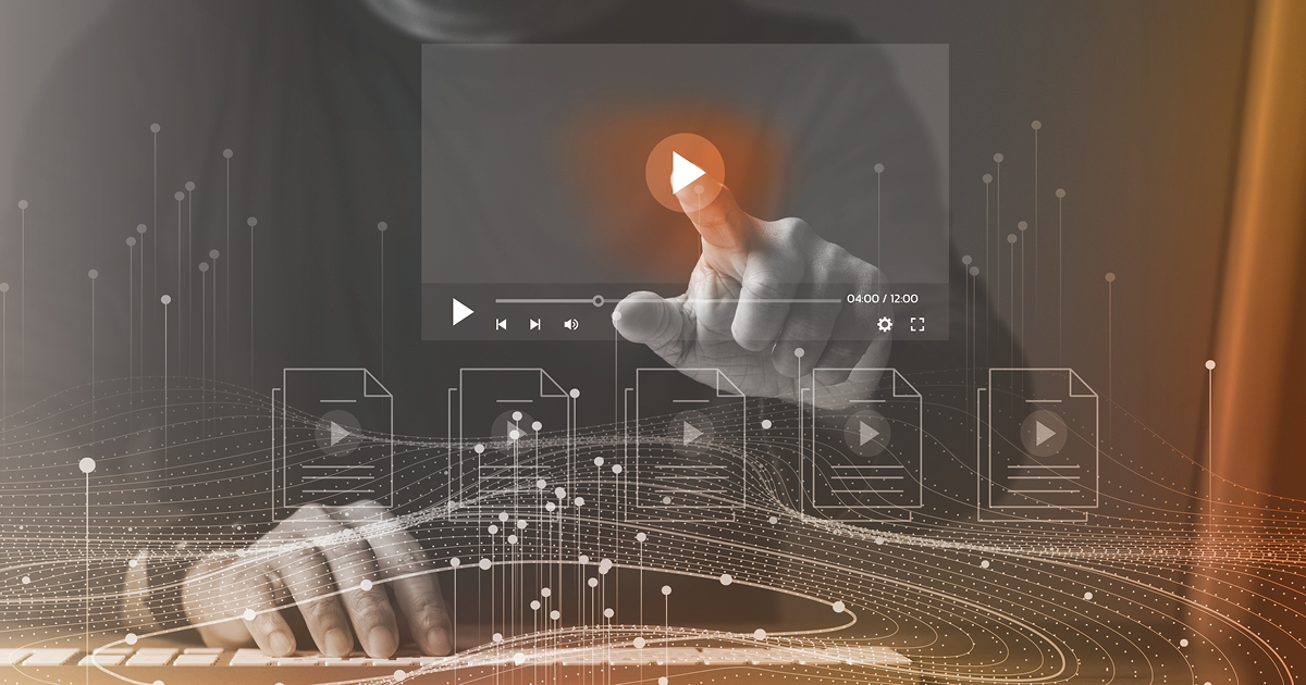 person reviewing data patterns through an orange lens