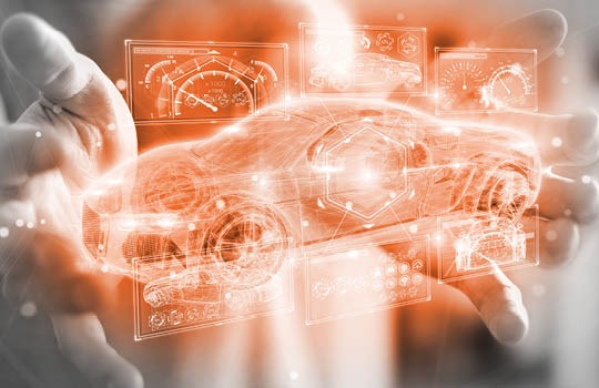 Person holding digital car design