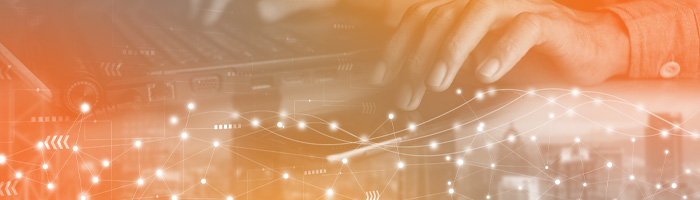 Hands and keyboard in the background of lights