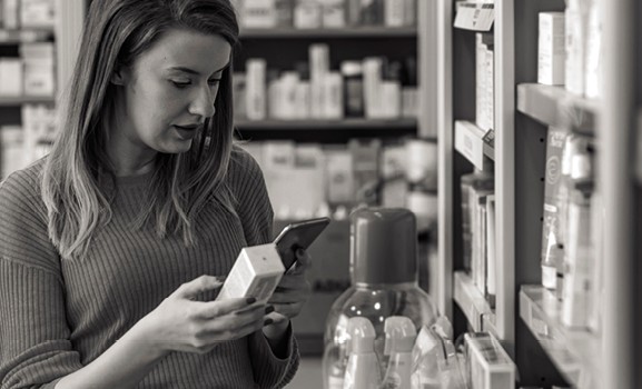 Person looking at a medical label