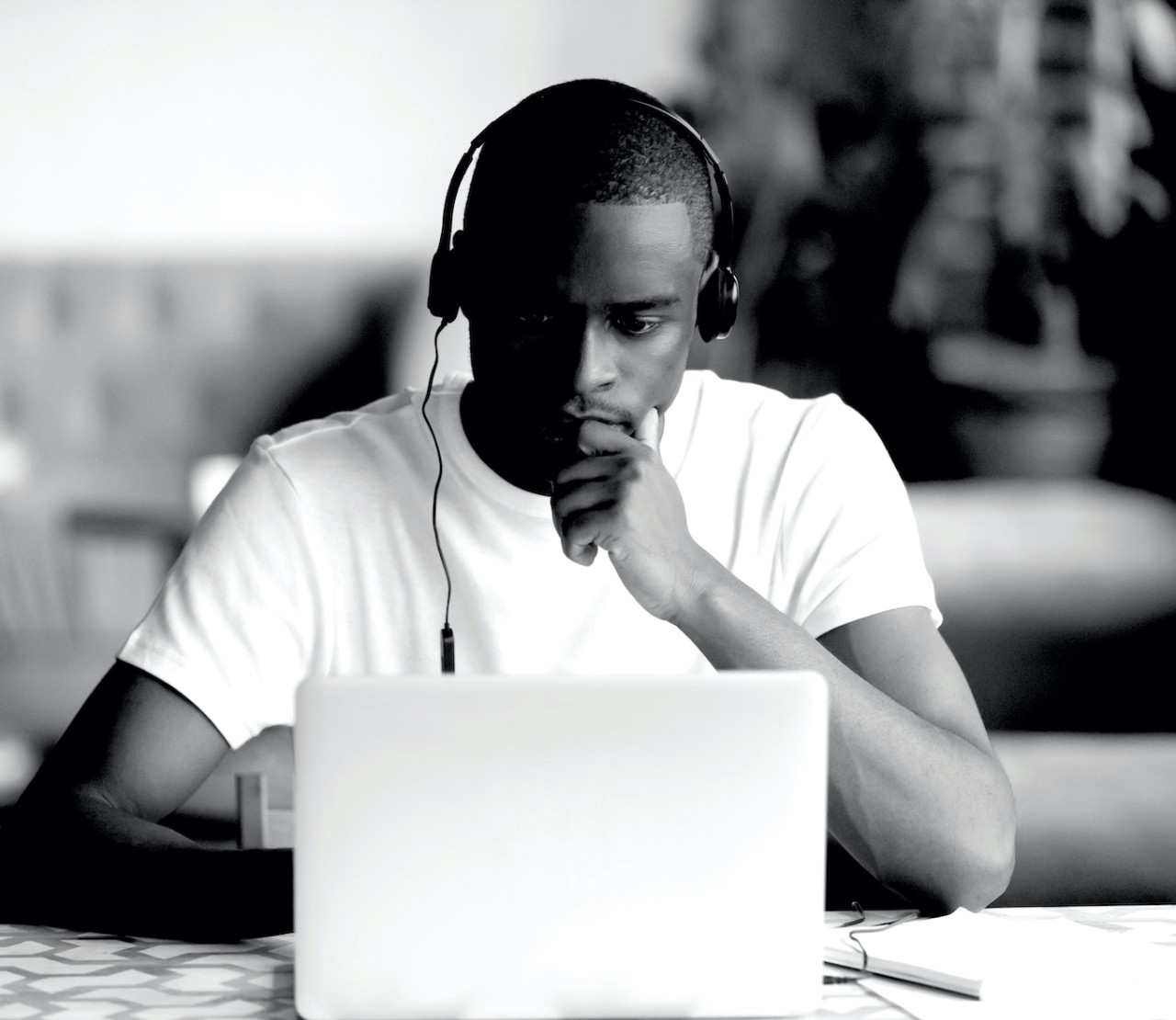 Person working intently on computer