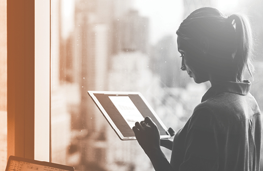 Businessperson working on a tablet