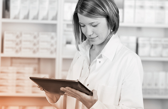 Health provider on laptop with medical labels