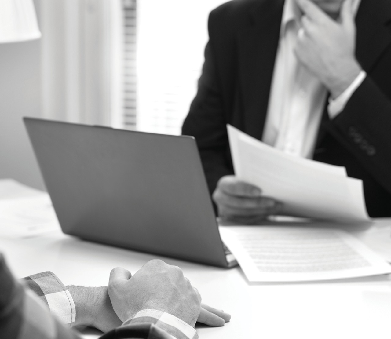 Businessperson reading legal document