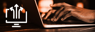 hands typing on a computer keyboard